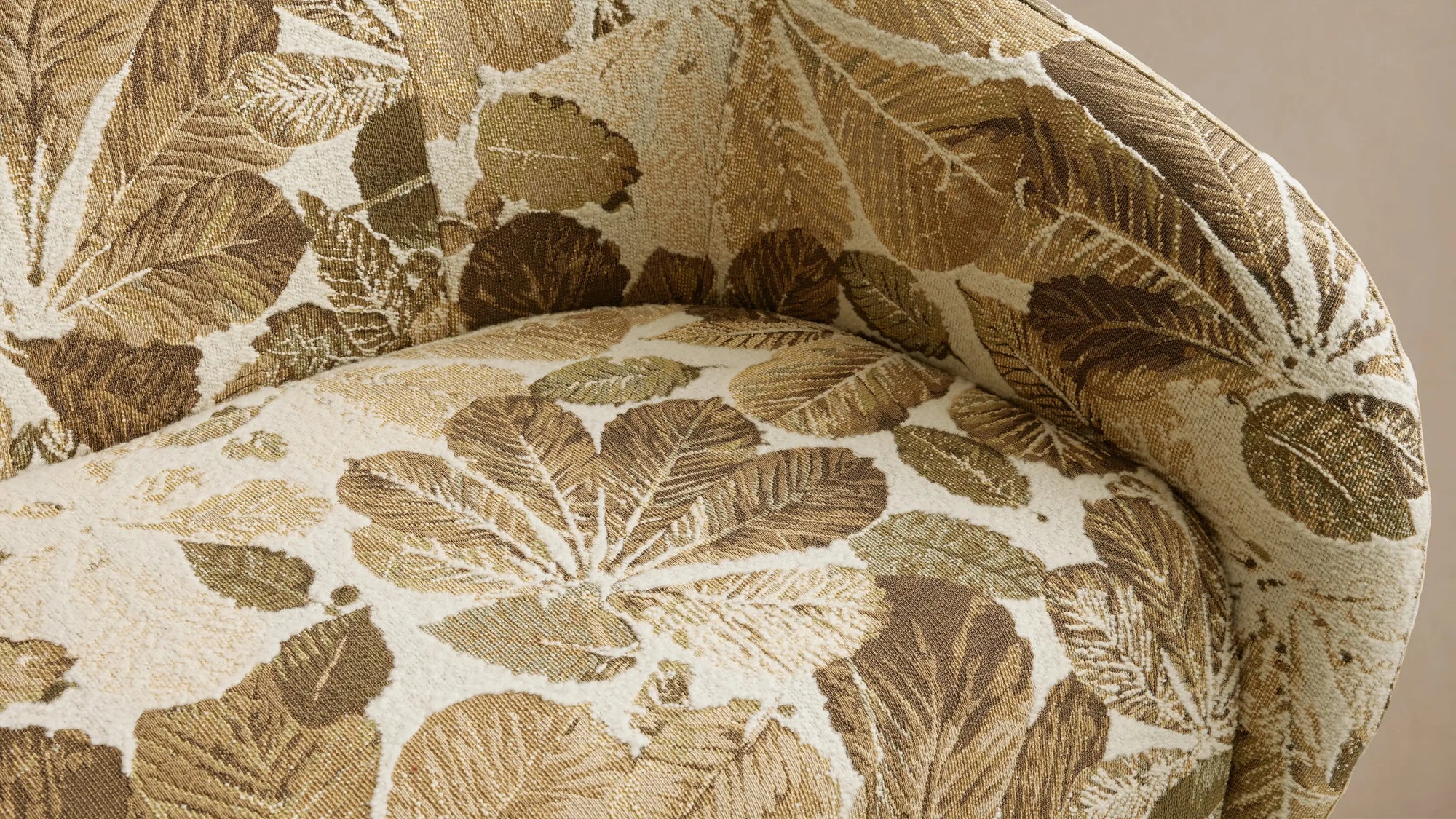 Arhaus custom upholstery with bright, textured floral fabric.